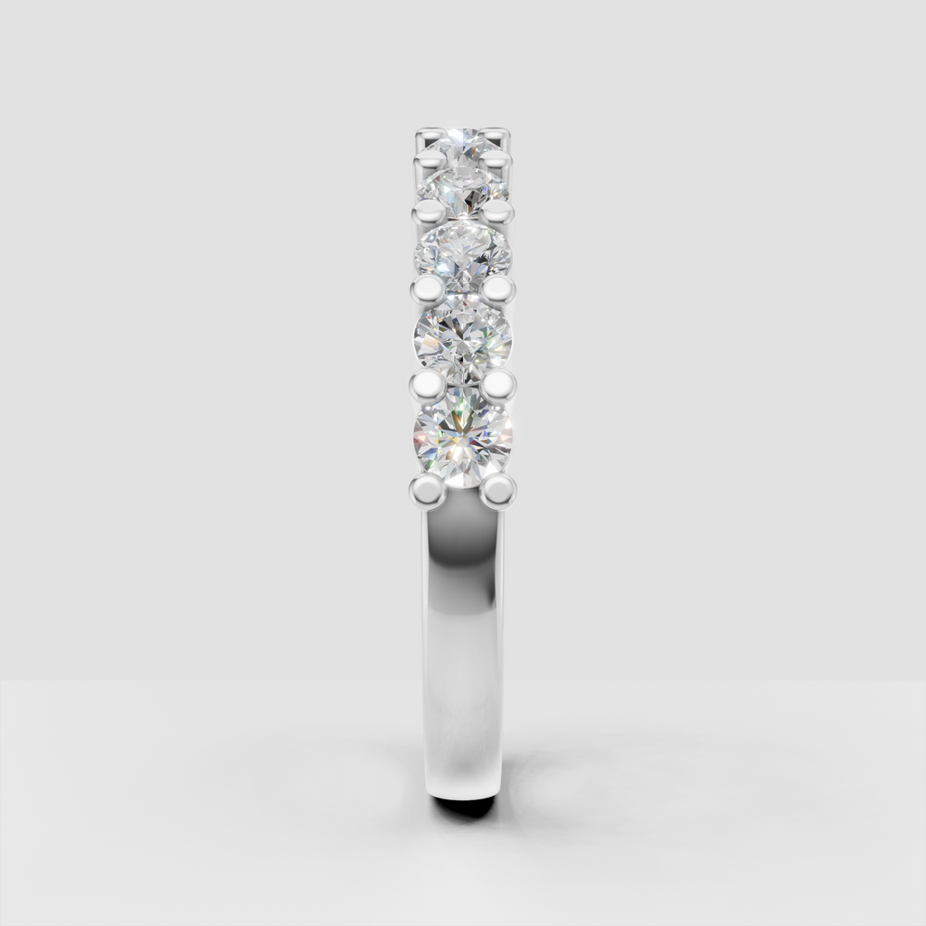 Half eternity wedding band with round diamond accents