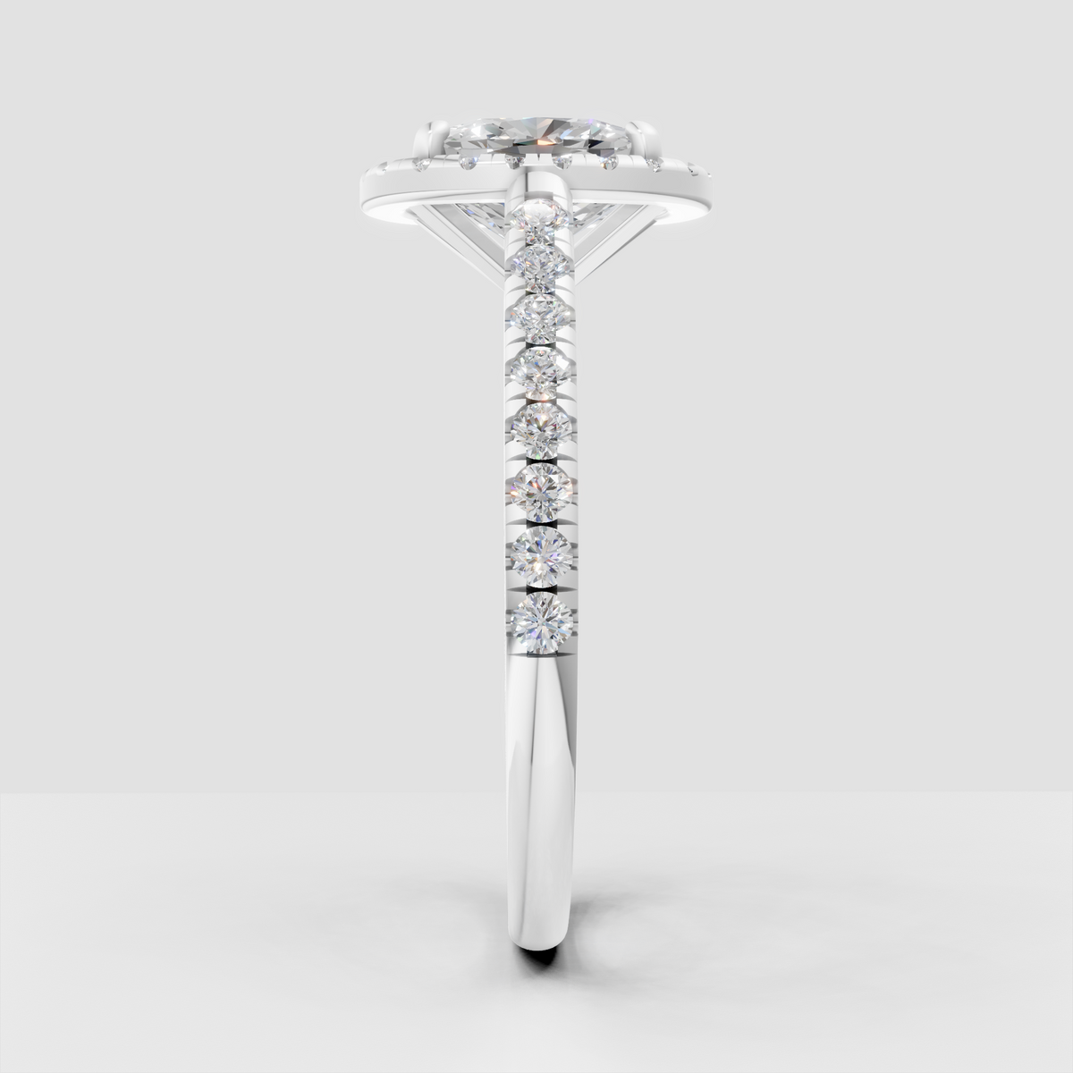 Cushion brilliant diamond halo ring with pave band