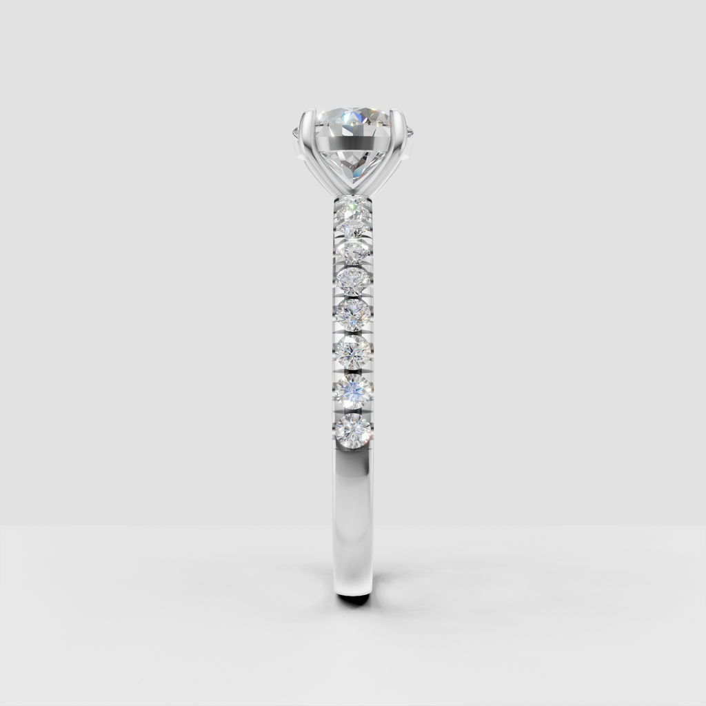 Elegant round diamond ring featuring a slim yellow gold band