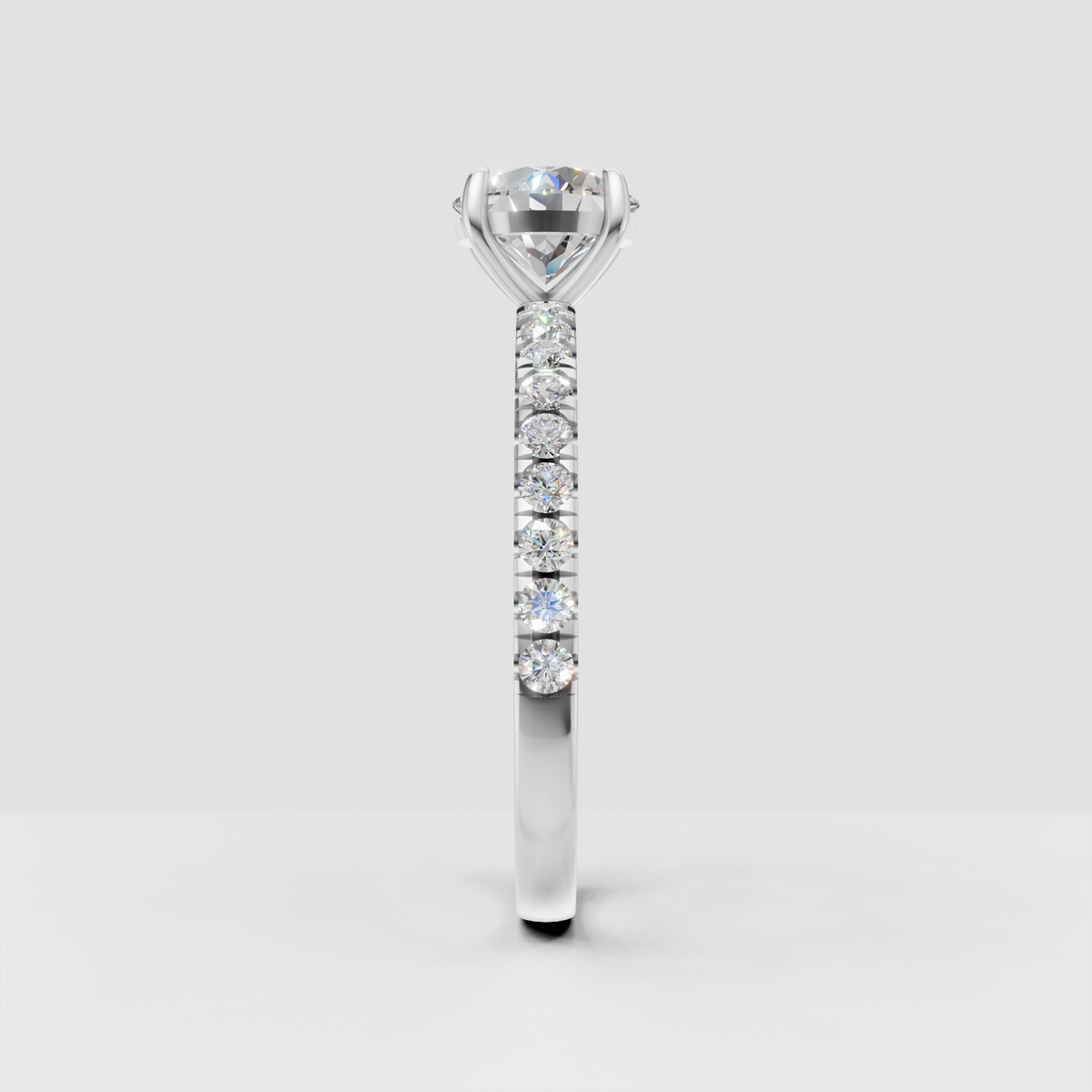 Elegant round diamond ring featuring a slim yellow gold band