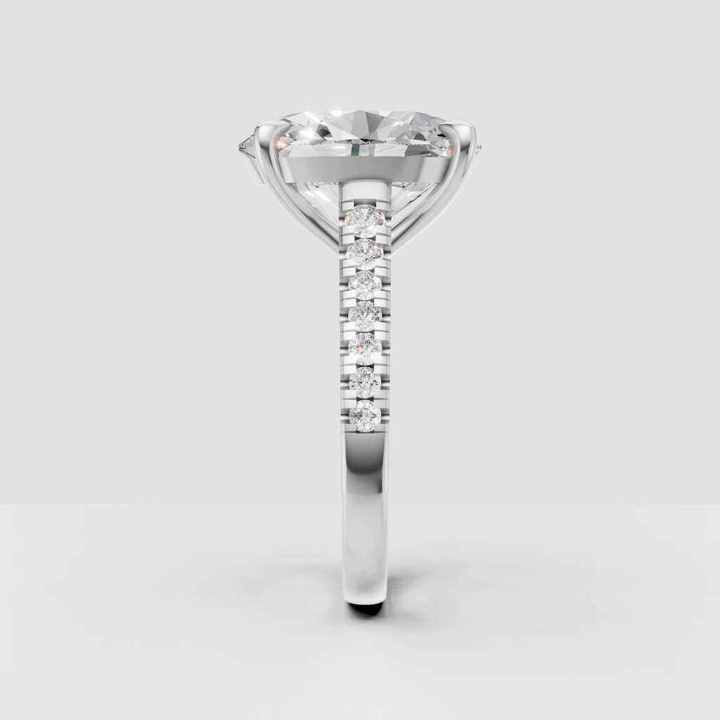 Oval diamond ring with pavé band