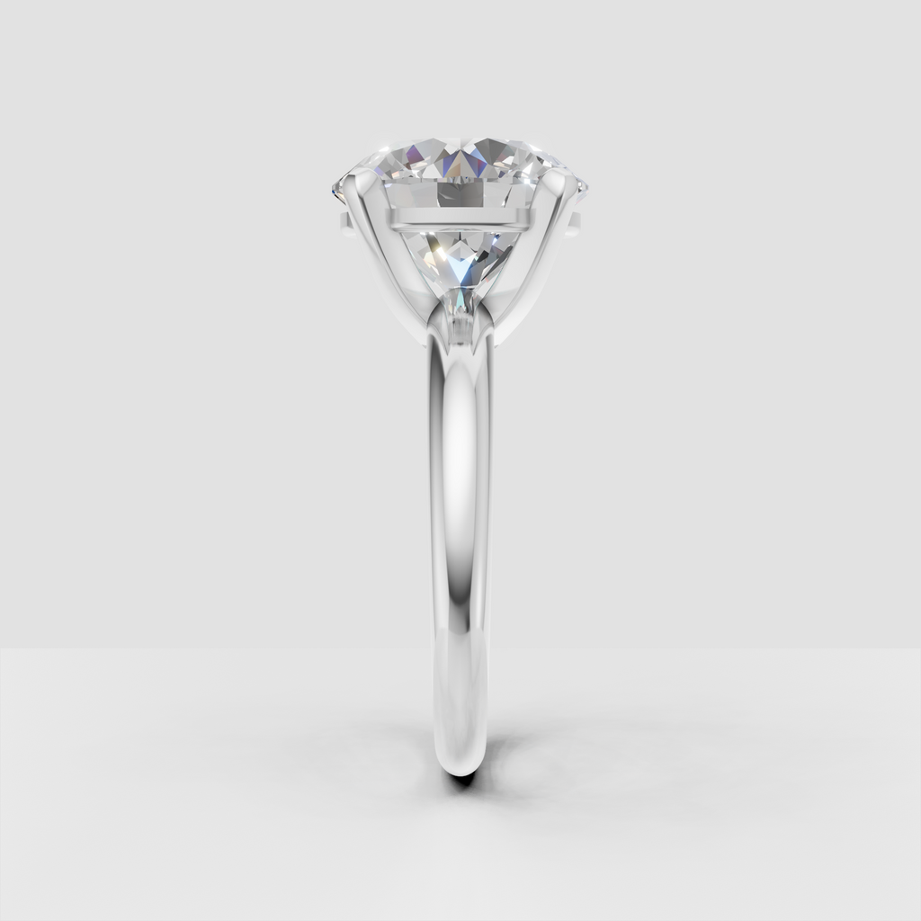 Minimalist round diamond engagement ring in yellow gold