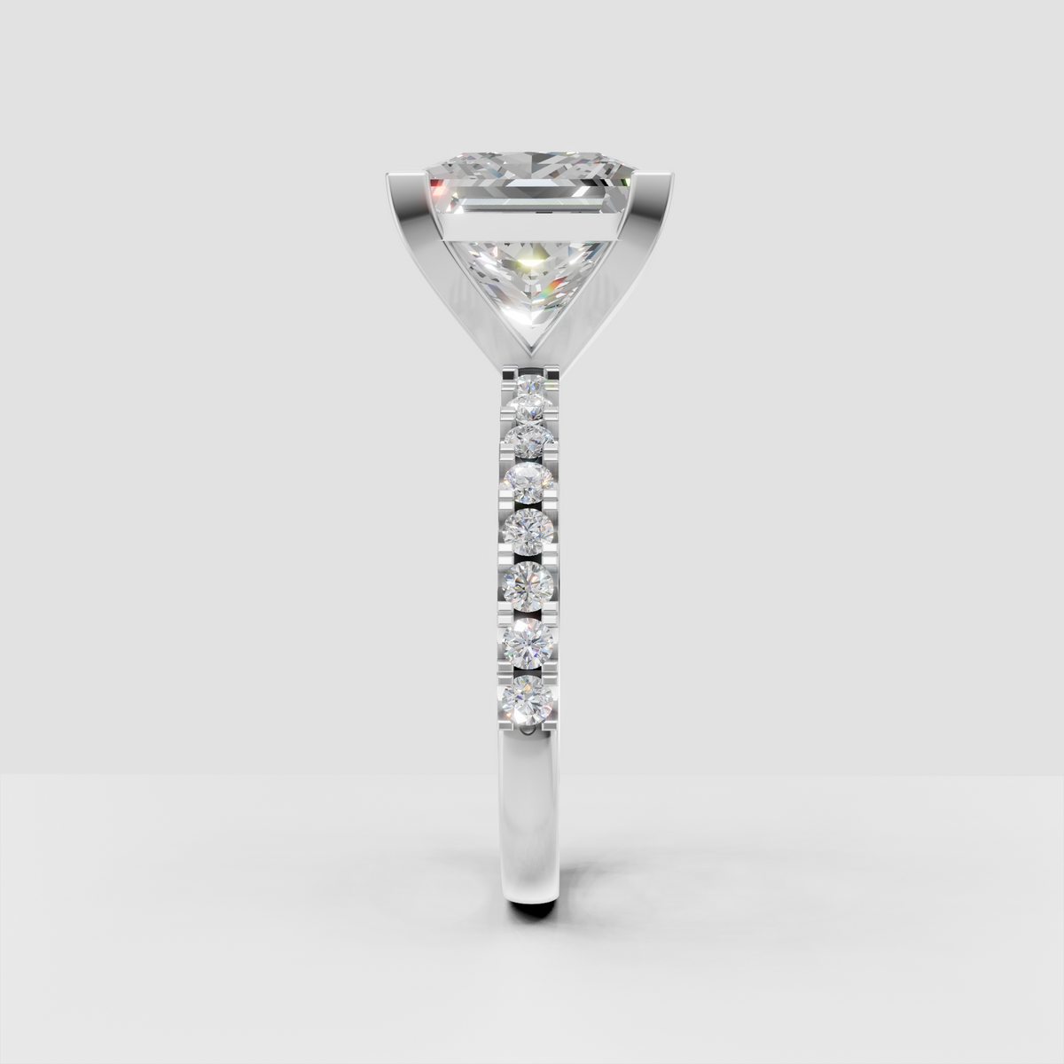 Princess cut center stone with square prong engagement ring setting