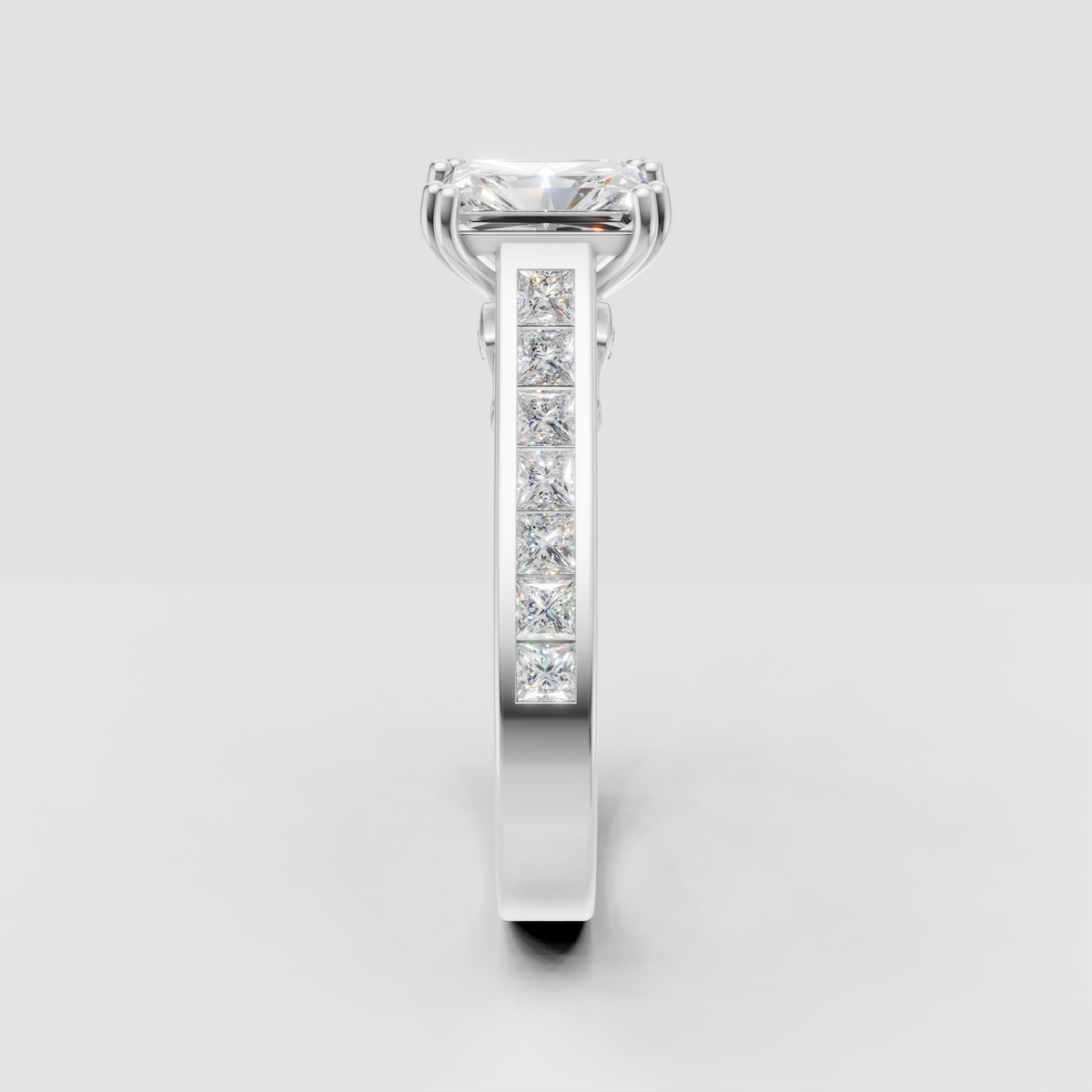 Radiant cut diamond ring with channel set accent stones
