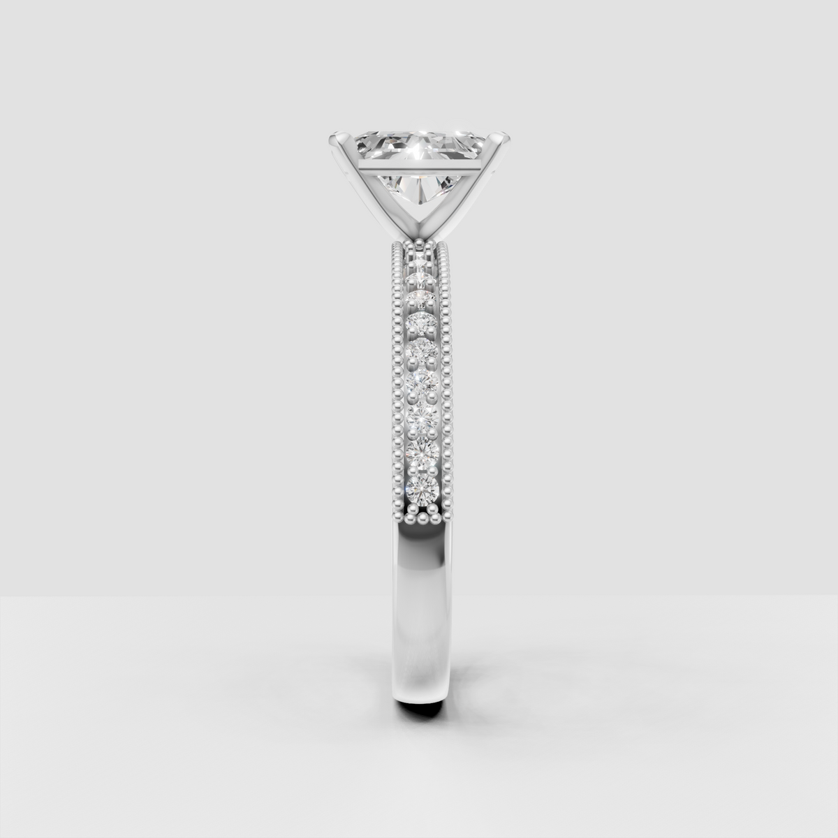 Elegant radiant cut diamond engagement ring with detailed gold band