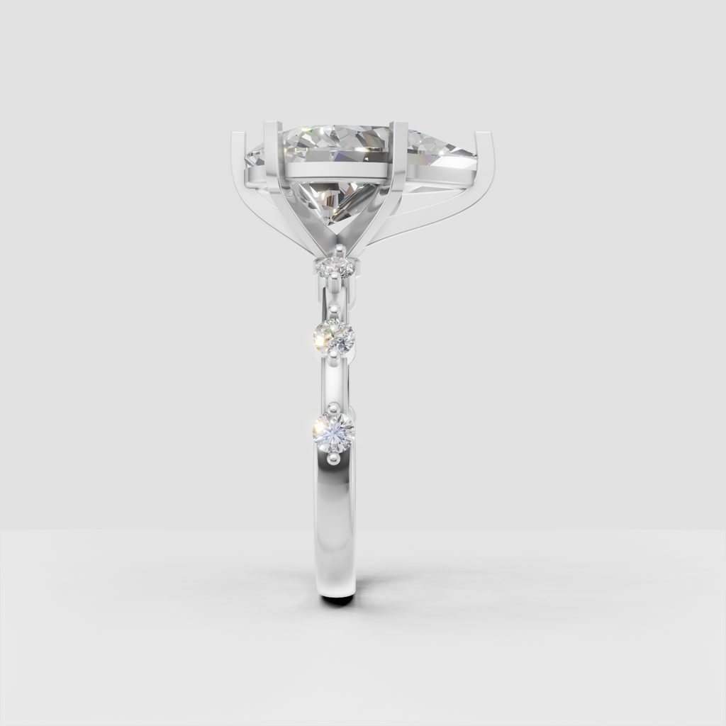 Pear shaped diamond ring with elevated cathedral gallery