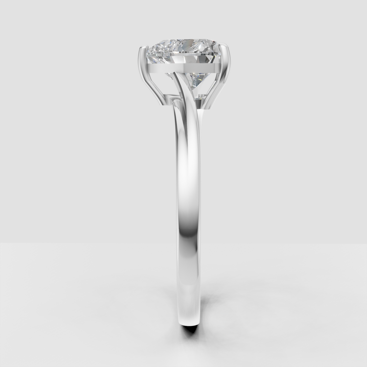 Romantic heart diamond ring with elevated solitaire setting and polished band