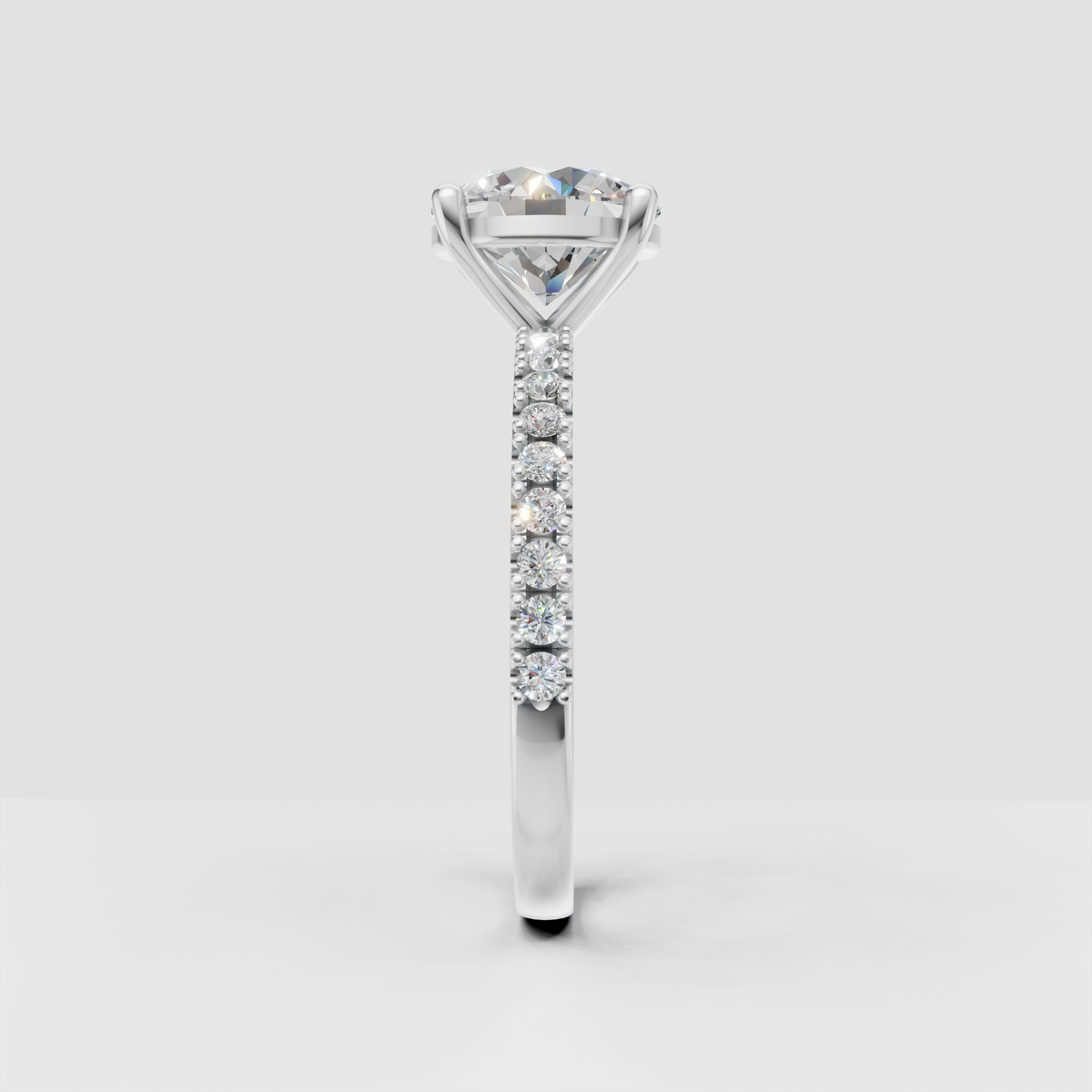 Elegant round diamond bridal ring with round side stones