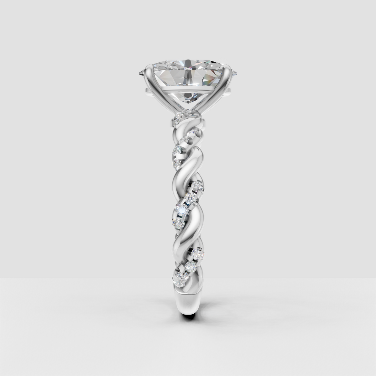 Yellow gold oval diamond ring with braided twisted band design