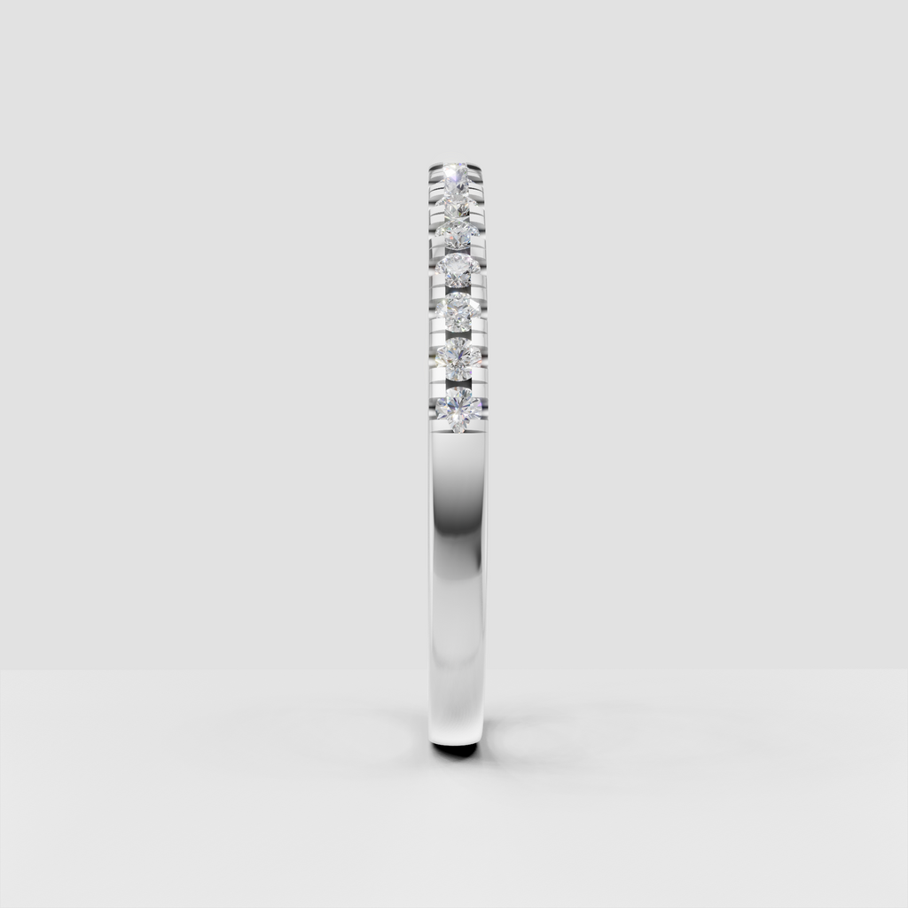 Classic round diamond wedding band with polished gold rails