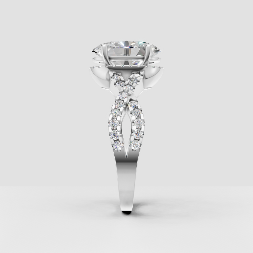 Oval Diamond bridal ring featuring detailed pave halo