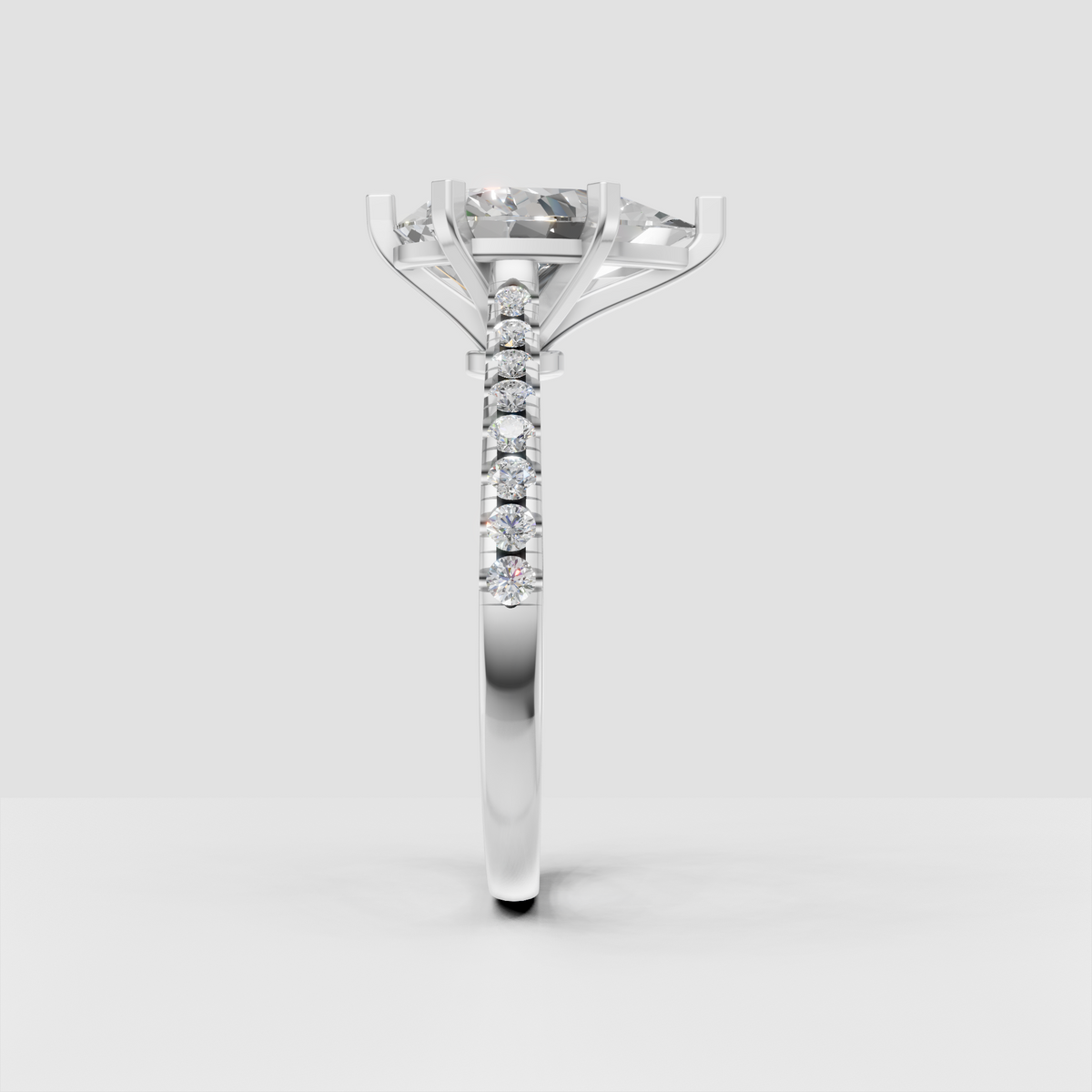Luxury pear-shaped diamond ring with tapered pavé shoulders