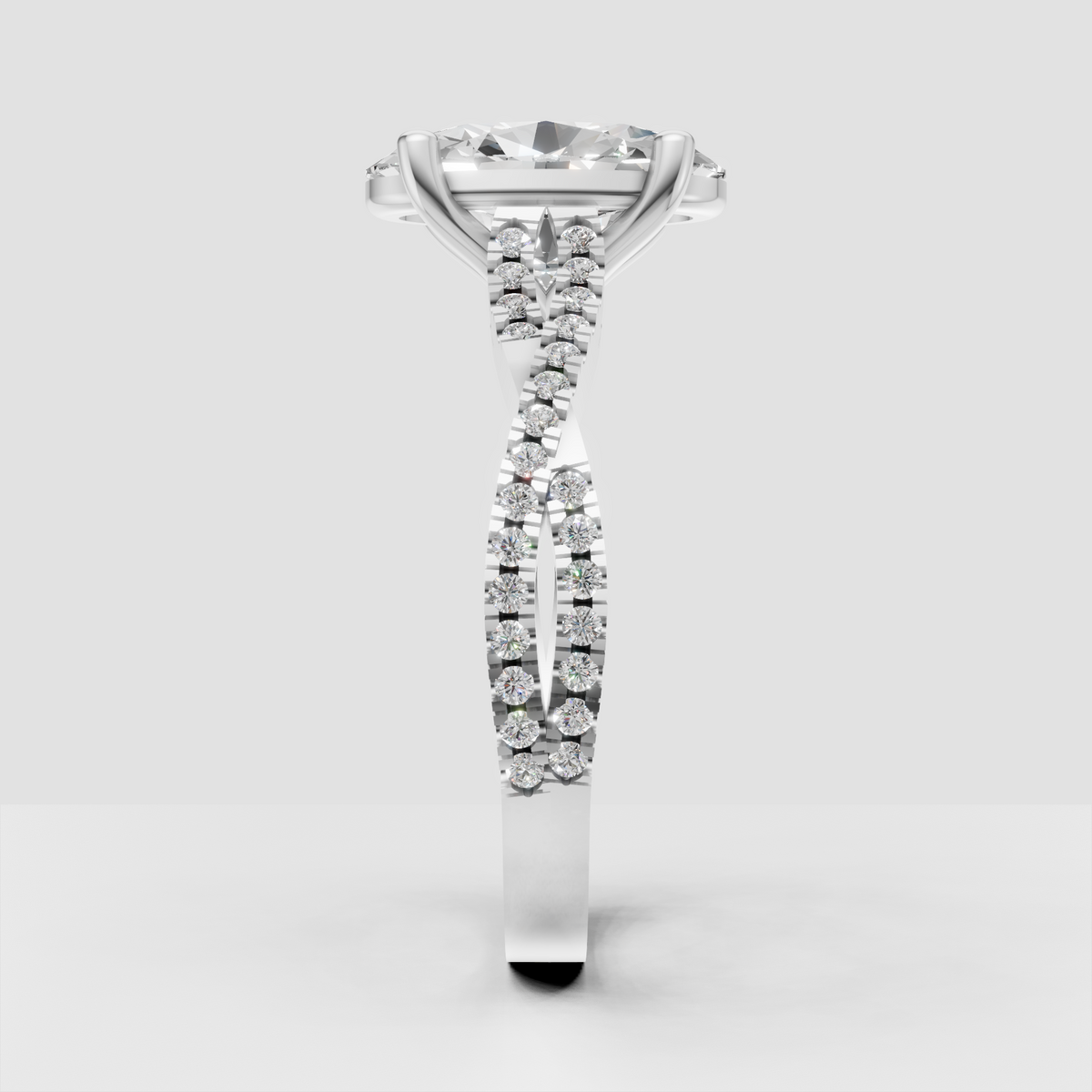 Oval Diamond engagement ring with sparkling side stones on shoulders