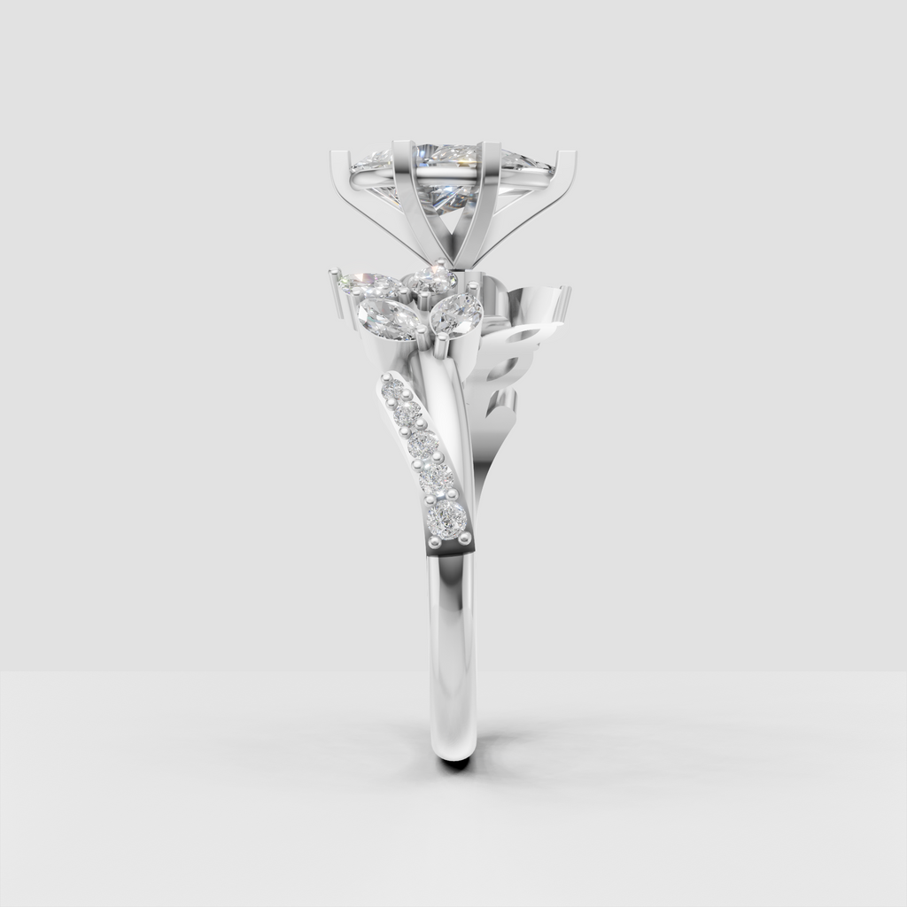 Botanical pear cut diamond ring with intricate leaf inspired design