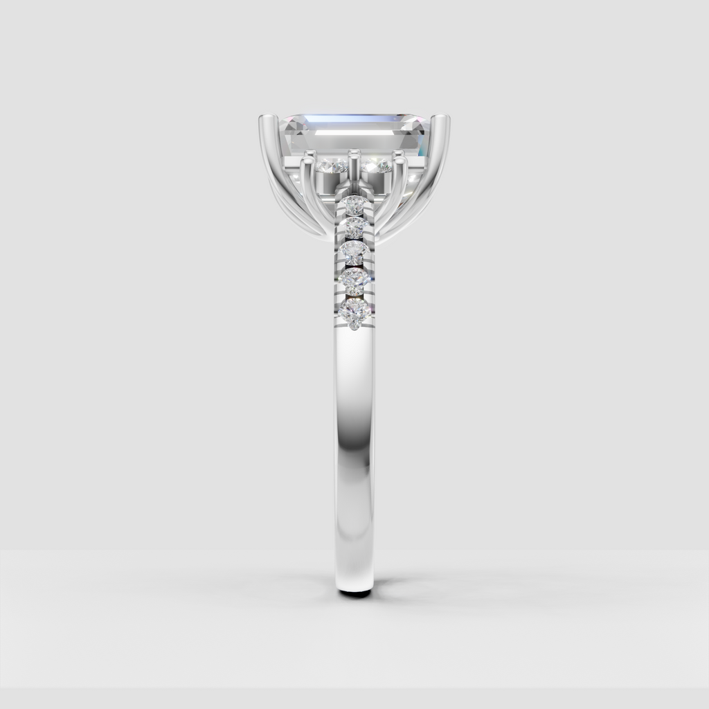 Elegant emerald cut diamond ring with round accent stones