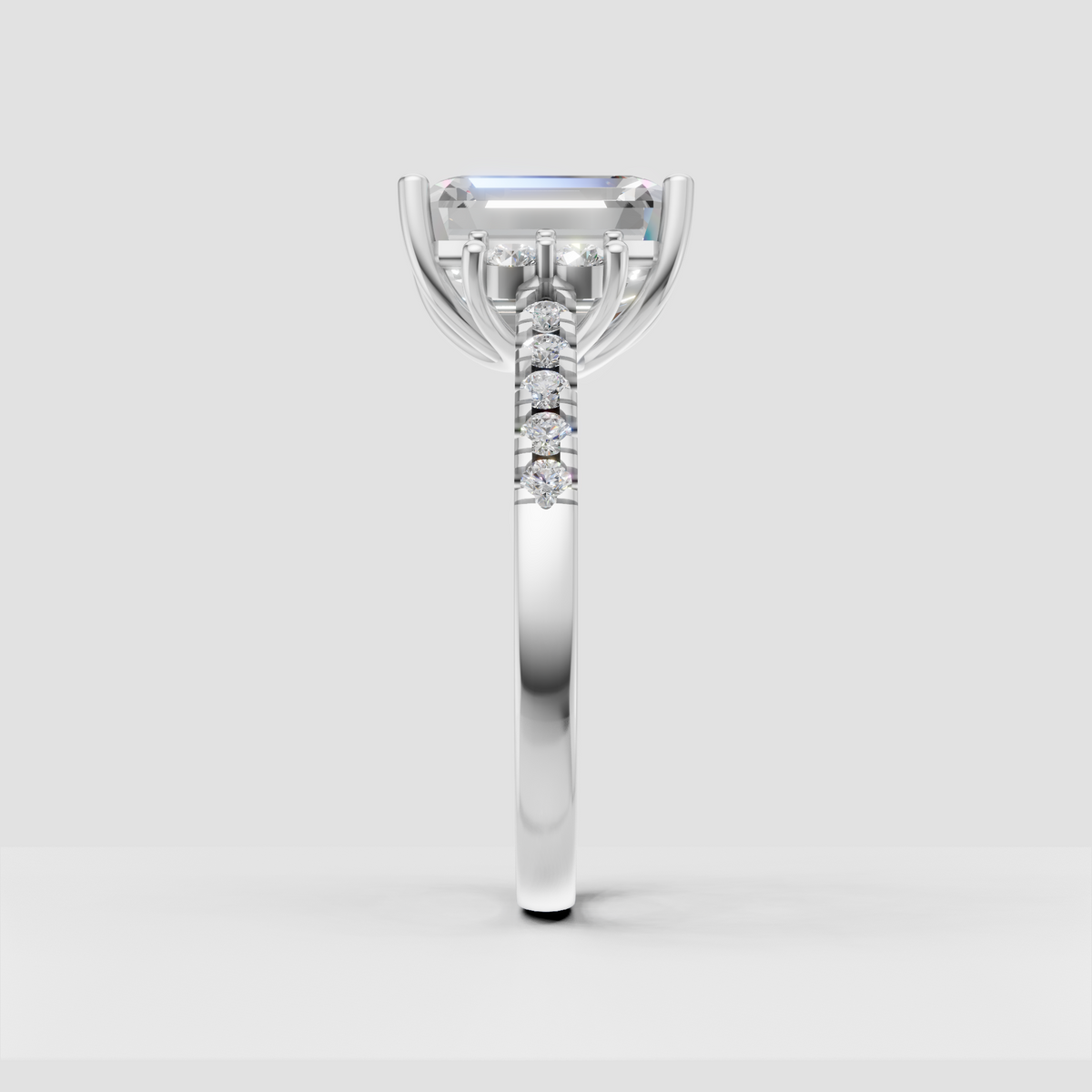 Elegant emerald cut diamond ring with round accent stones