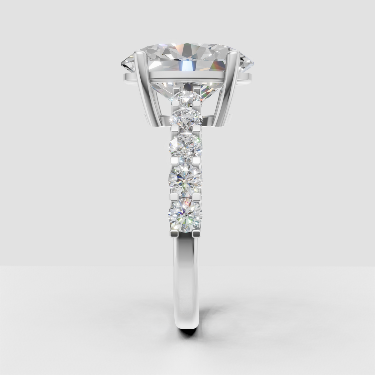 Pear diamond halo ring featuring marquise accent stones