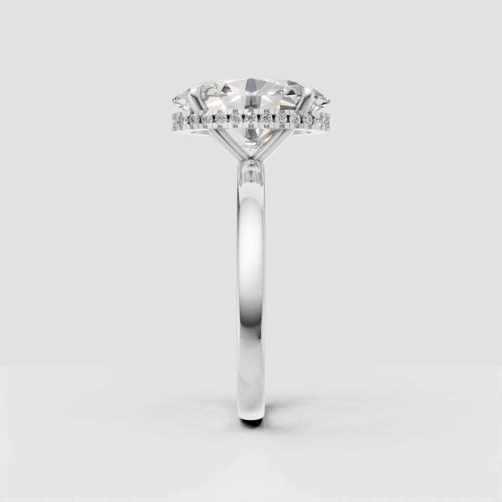 Oval center diamond with hidden halo setting