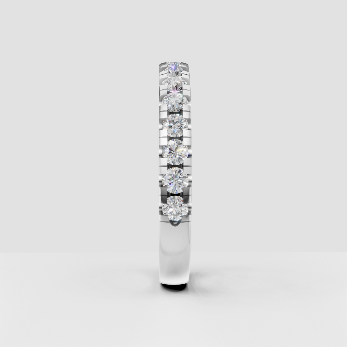 Full eternity diamond ring with round brilliant accent stones