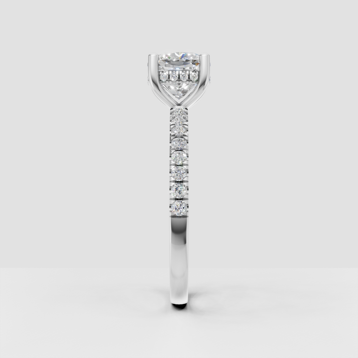 Cushion diamond ring with hidden accent stones beneath center