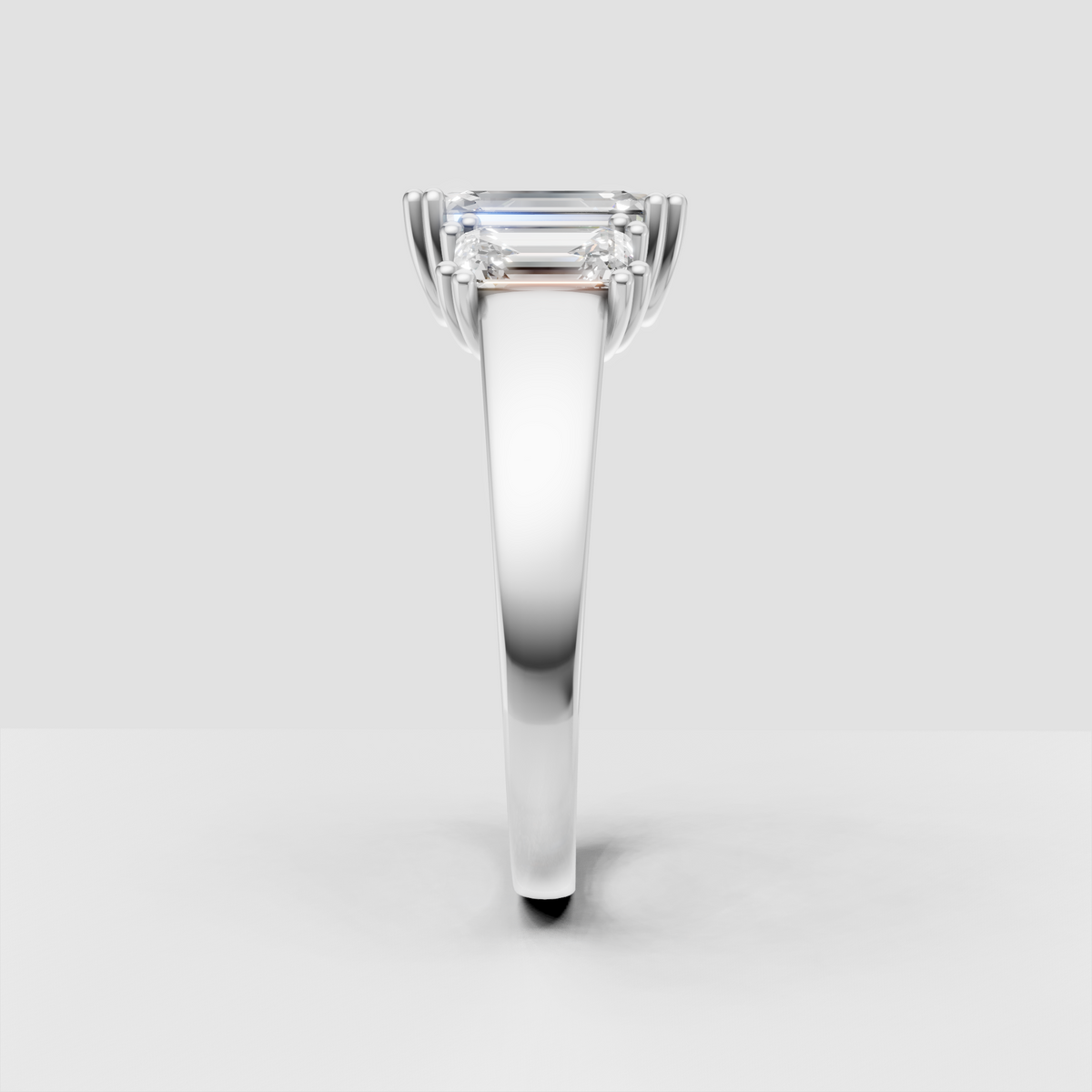 Emerald cut Diamond engagement ring with architectural design