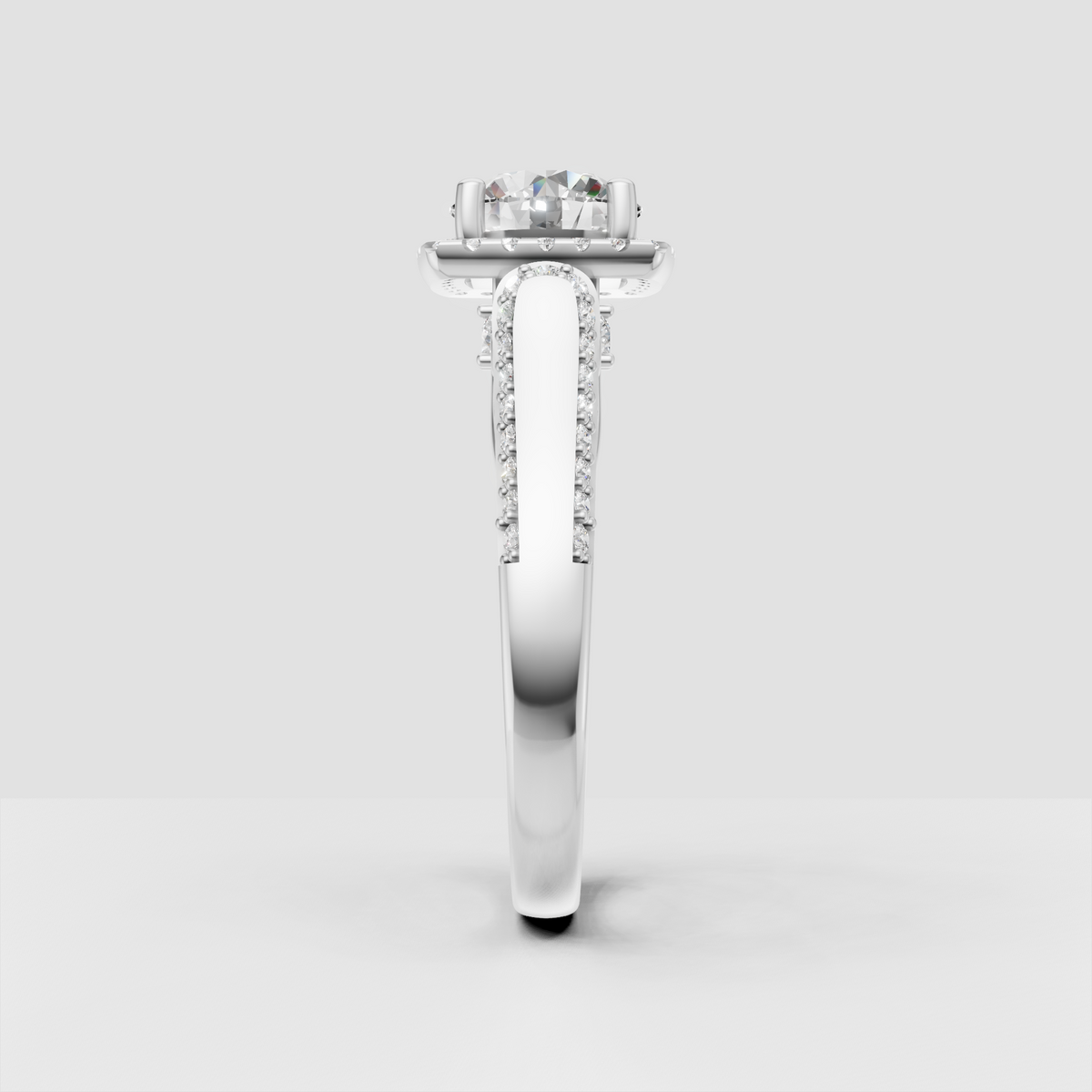 Round brilliant diamond ring with rectangular cushion halo and ornate detailing