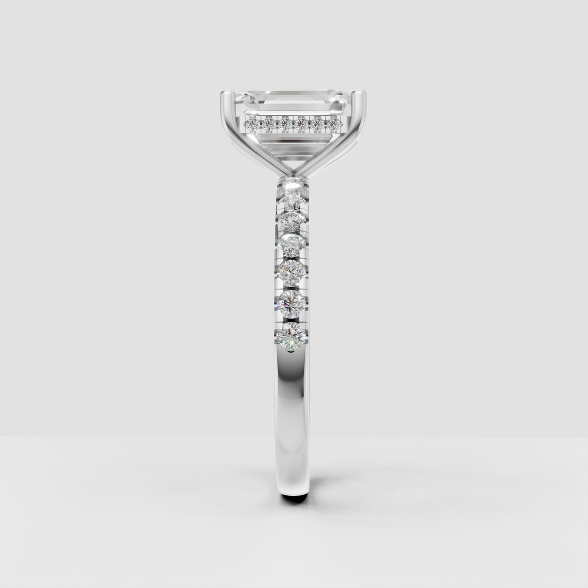 Yellow gold emerald cut bridal ring with diamond band