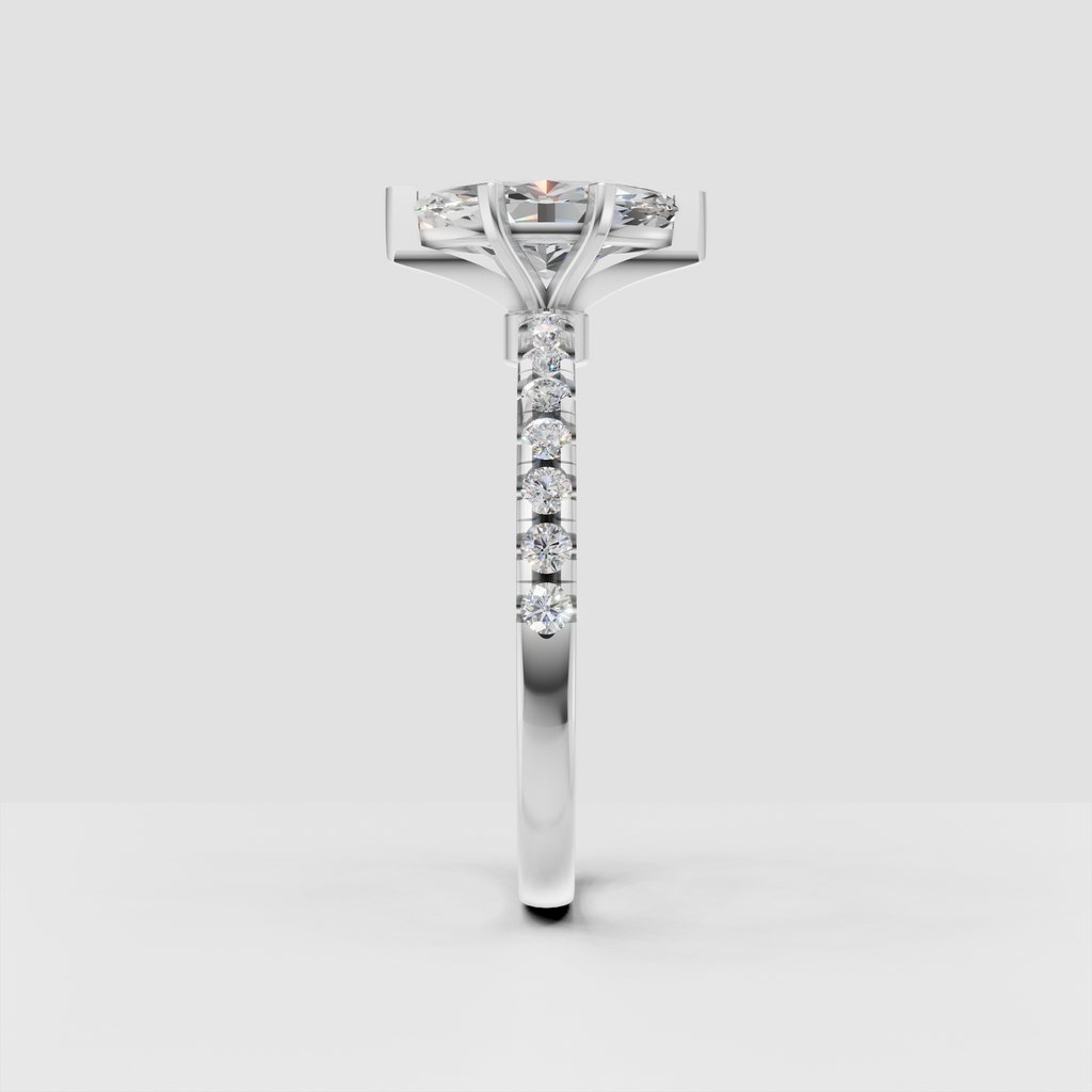 Yellow gold marquise diamond engagement ring with elevated setting