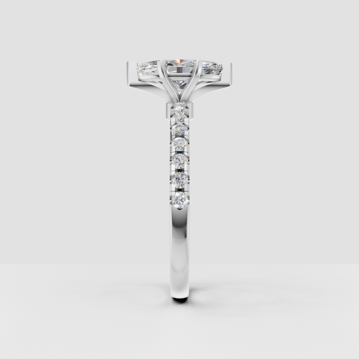 Yellow gold marquise diamond engagement ring with elevated setting