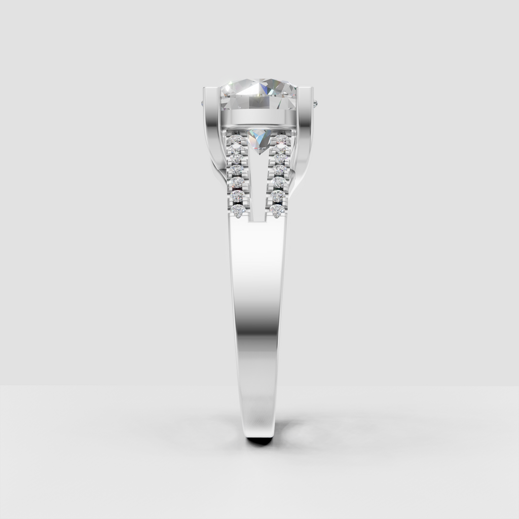 Round diamond ring featuring a split shank and pave-set stones