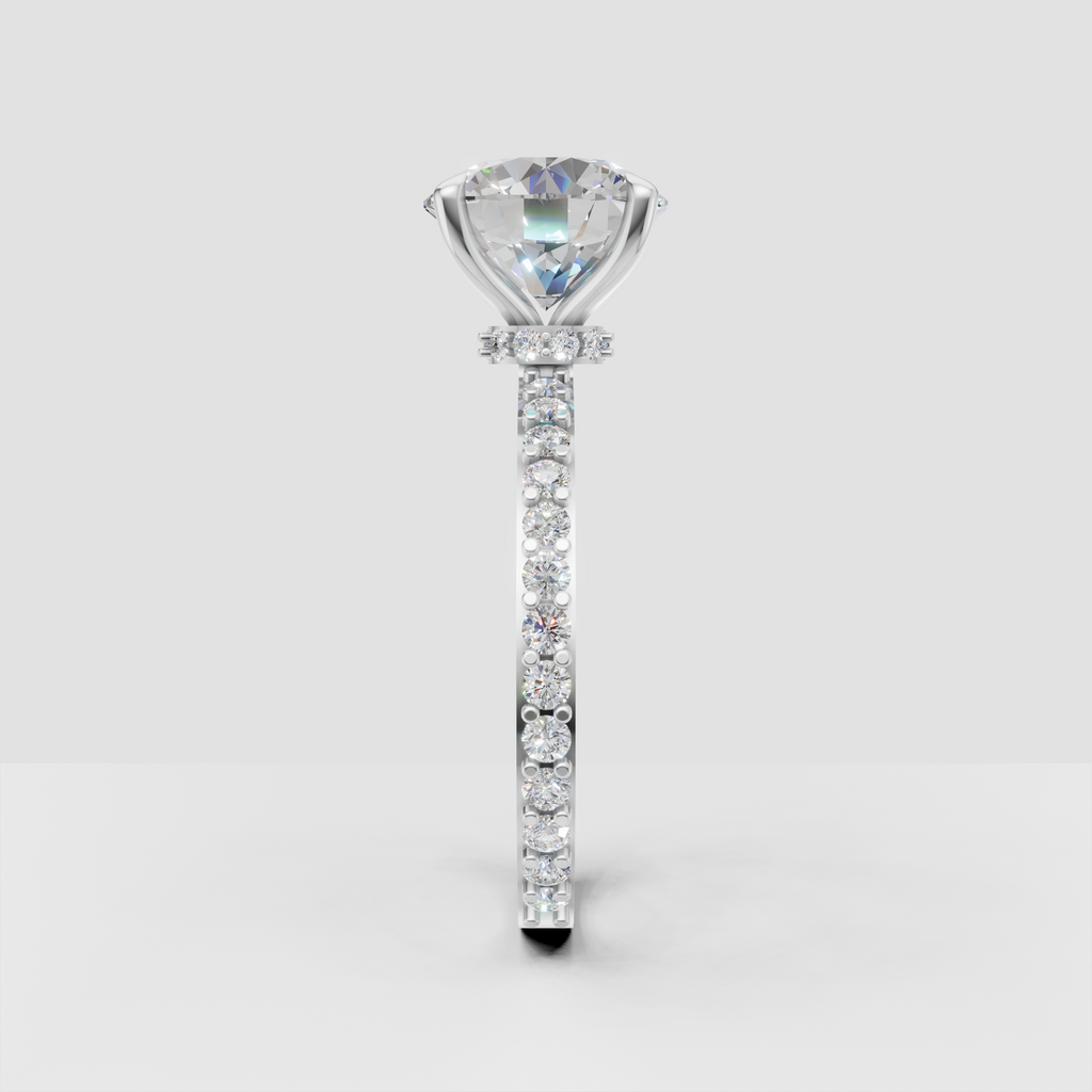 Round diamond wedding ring featuring a slim pavé set gold band