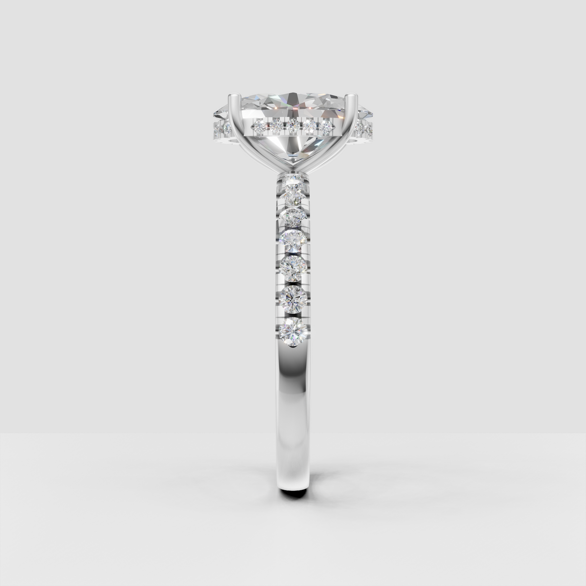 Contemporary pear diamond ring with cathedral profile and sparkling side stones