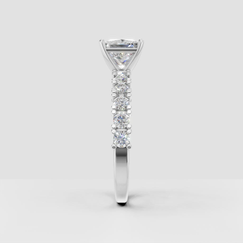 Princess cut engagement ring with sparkling round diamond shoulders