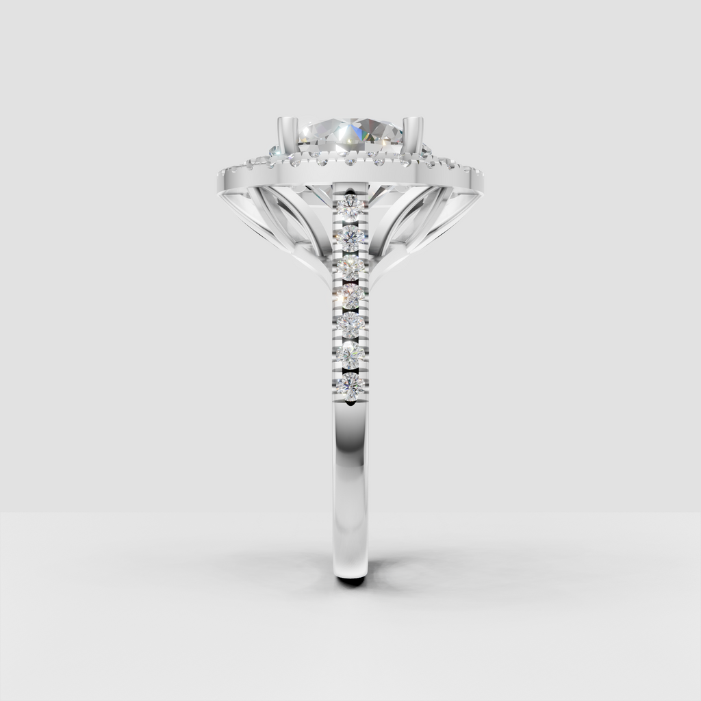 Yellow gold cathedral engagement ring with round diamond center stone