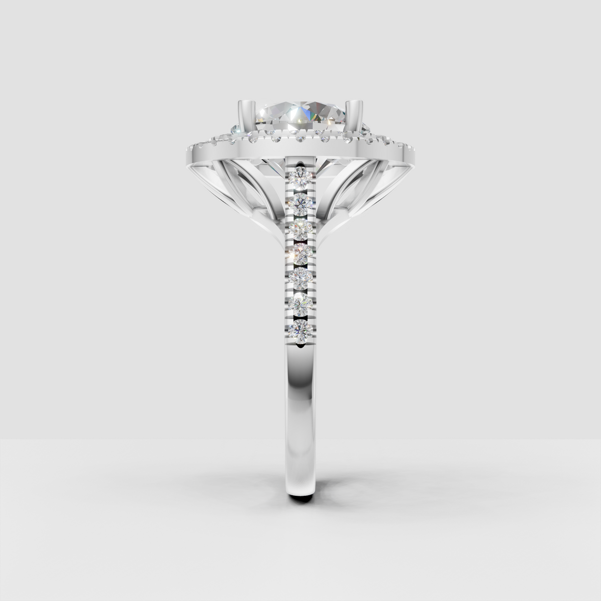 Yellow gold cathedral engagement ring with round diamond center stone