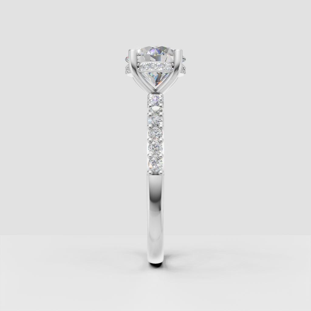Round diamond cathedral engagement ring with diamond-accented under-gallery