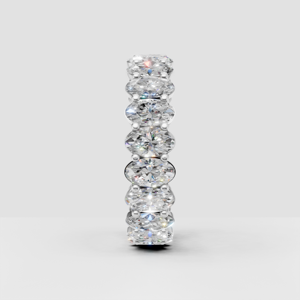 Oval diamond band with elongated oval stones and prongs