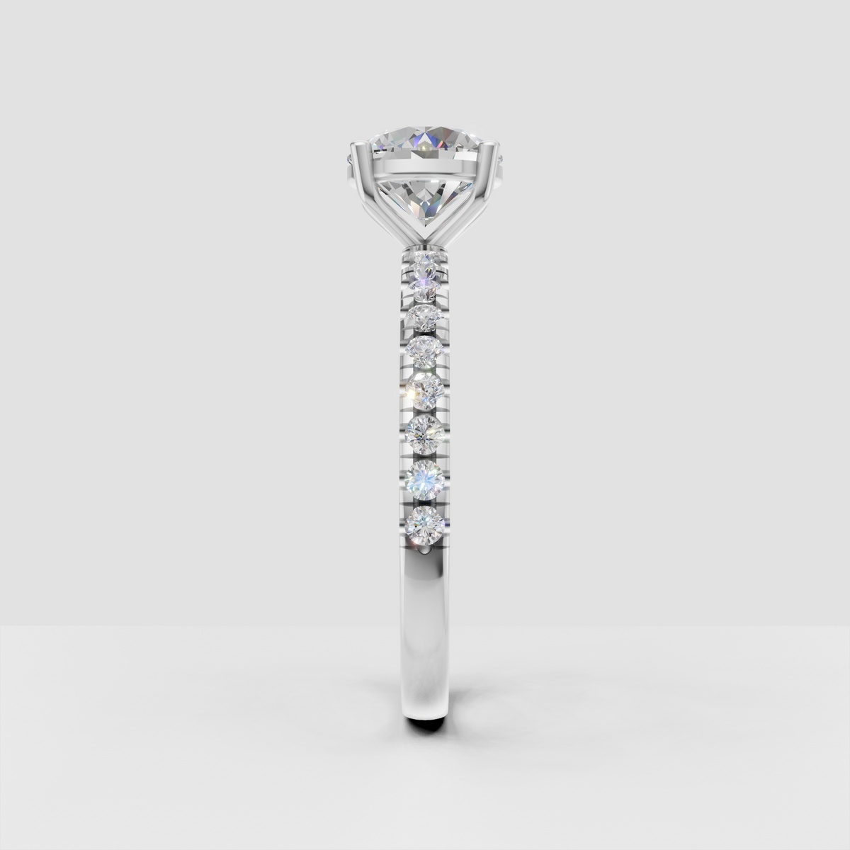 Elegant round brilliant diamond engagement ring with pavé band