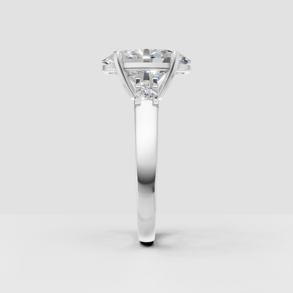 Luxury oval diamond engagement ring with symmetrical graduated side stones