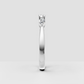 Polished gold marquise engagement ring with symmetrical gemstone layout