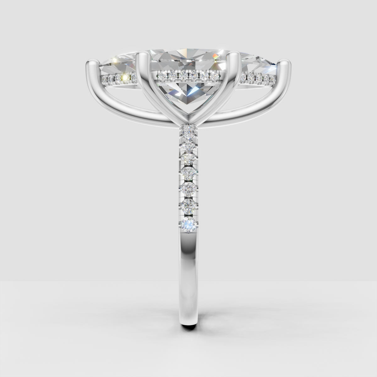 Vintage marquise diamond ring with delicate pave accents