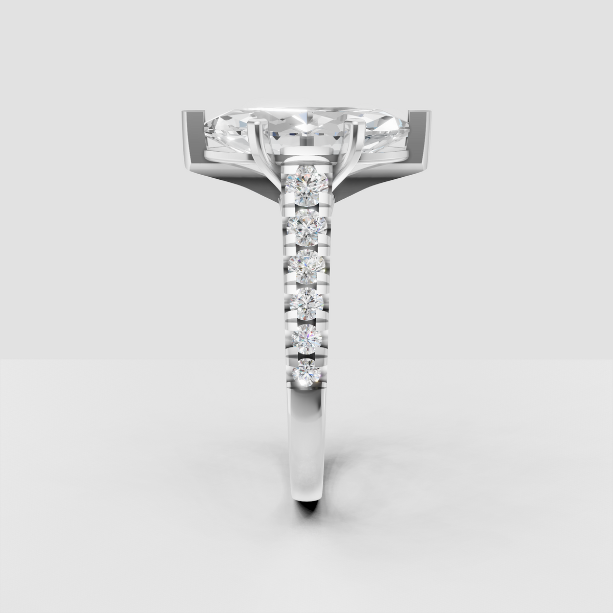 Contemporary marquise diamond ring with cathedral setting and decorative gallery