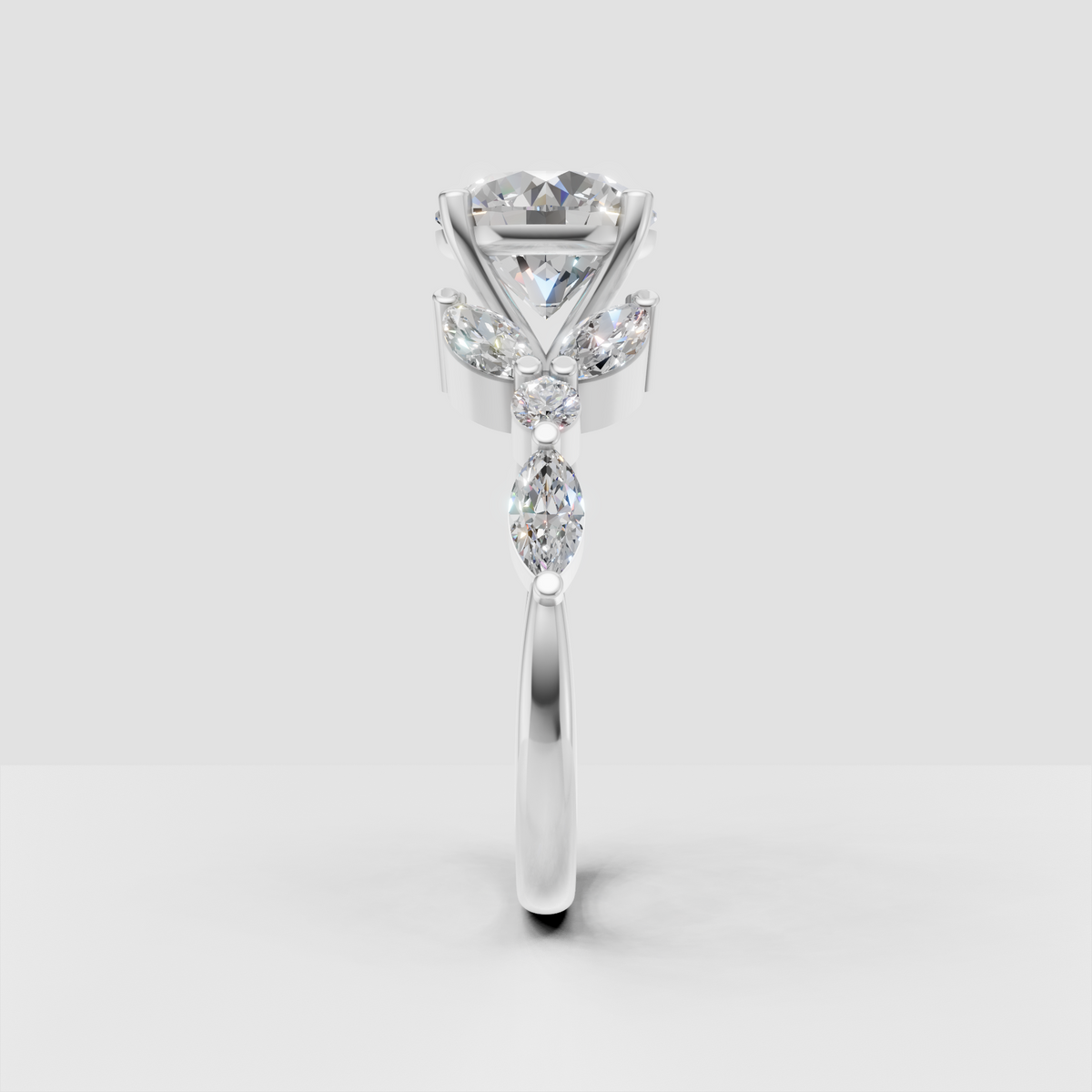 Floral round diamond engagement ring with marquise shaped side stones
