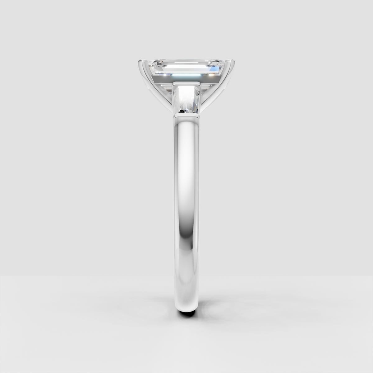 Sophisticated emerald cut solitaire ring in polished yellow gold