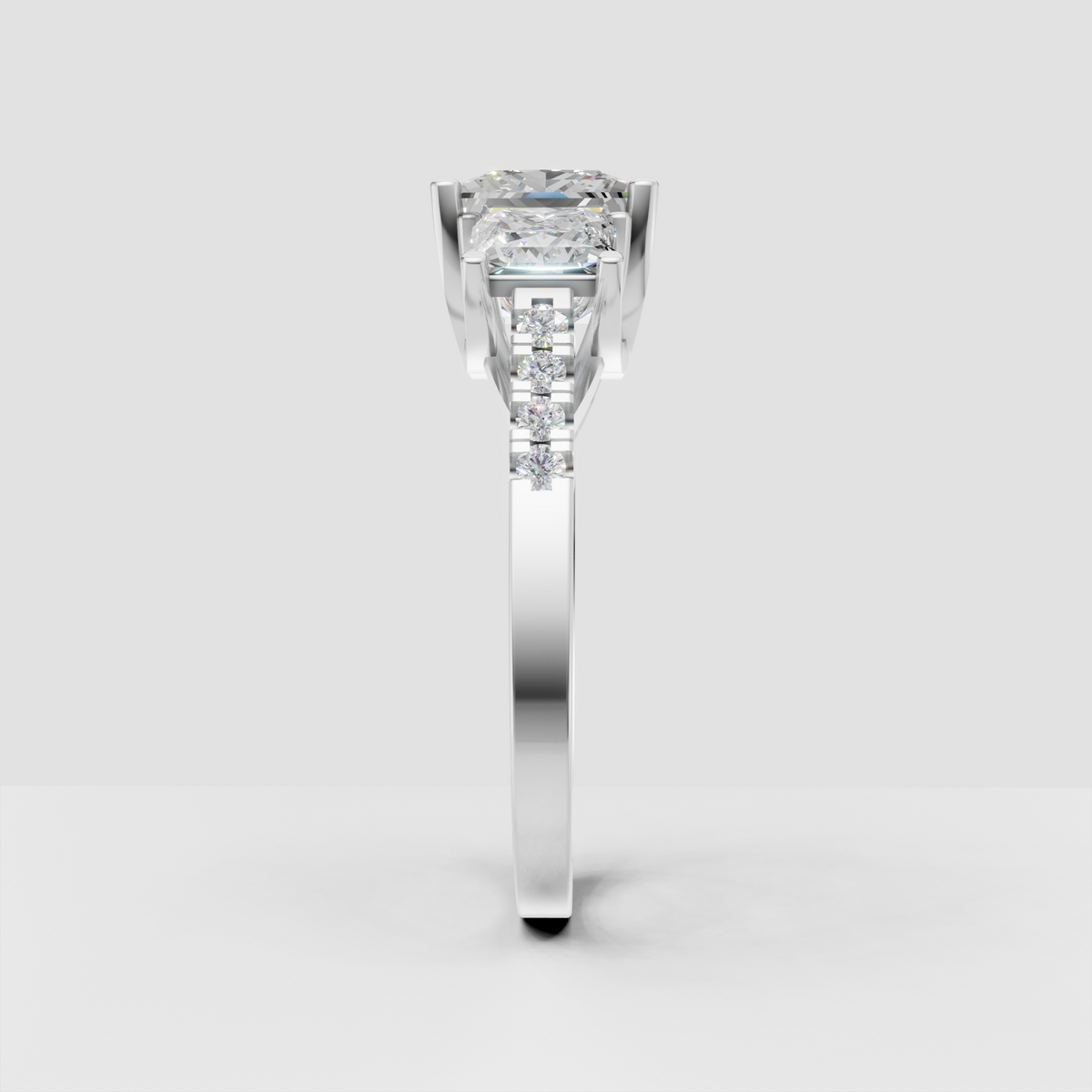 Elegant three stone diamond engagement ring in polished gold