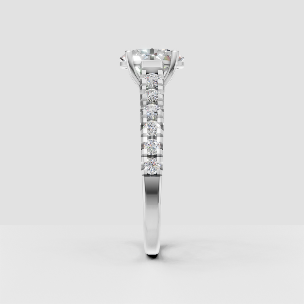 Four-prong oval solitaire engagement ring in yellow gold