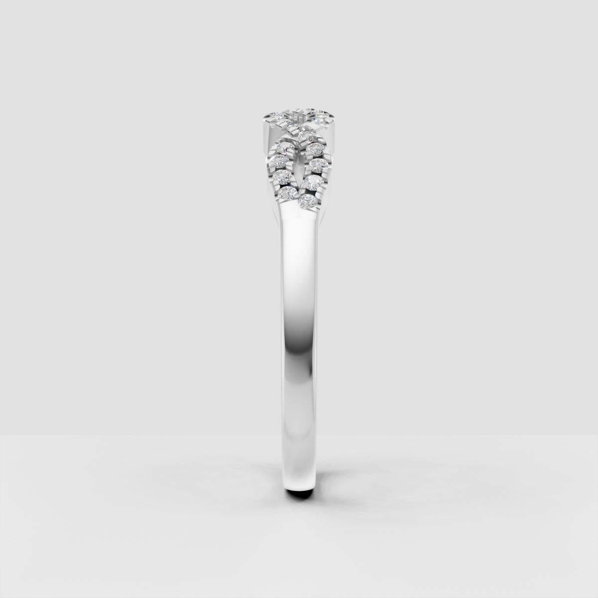 Yellow gold diamond band with intertwined curves