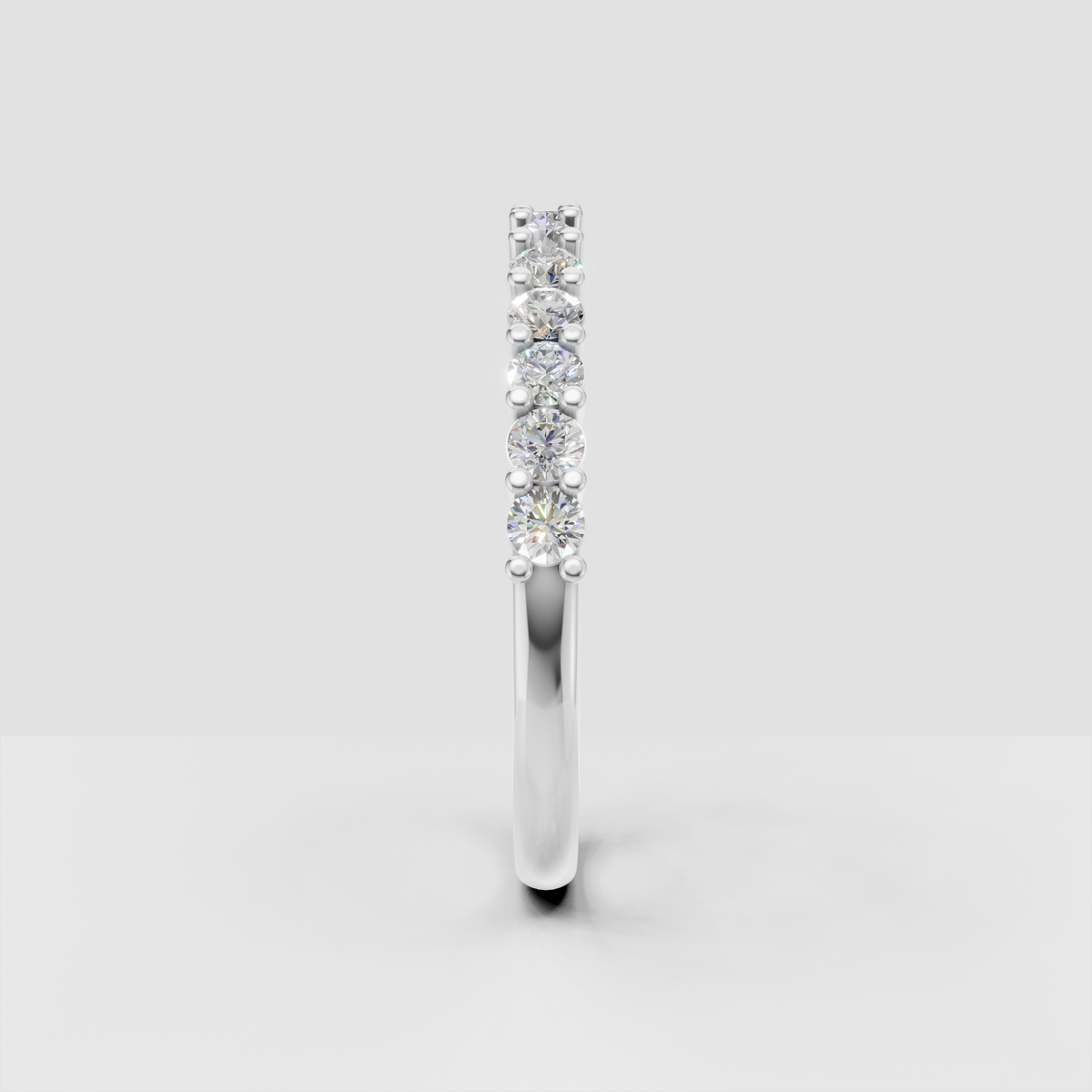 Elegant yellow gold diamond band with multiple round-cut stones