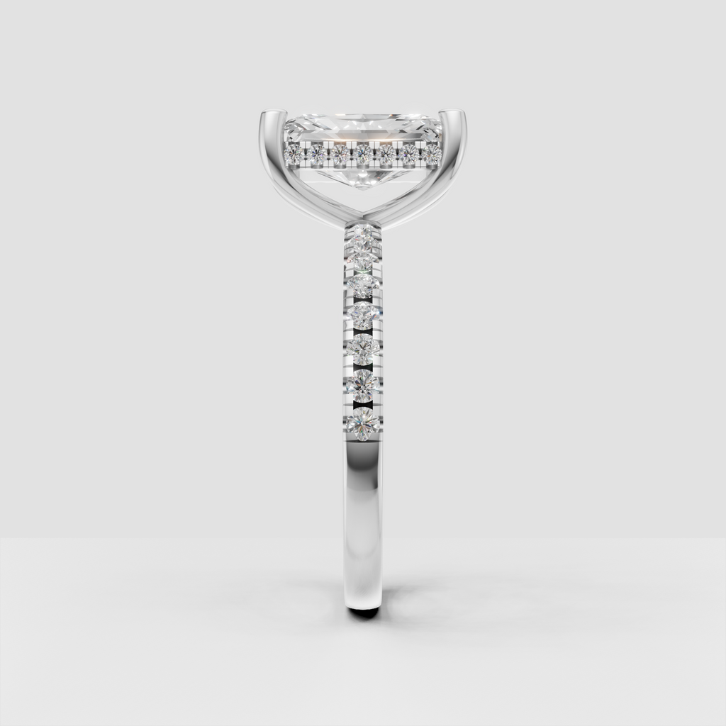 Radiant center diamond ring with sparkling pavé shoulders