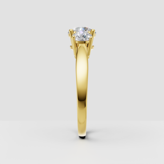 Yellow gold three-stone Diamond ring with classic prong setting
